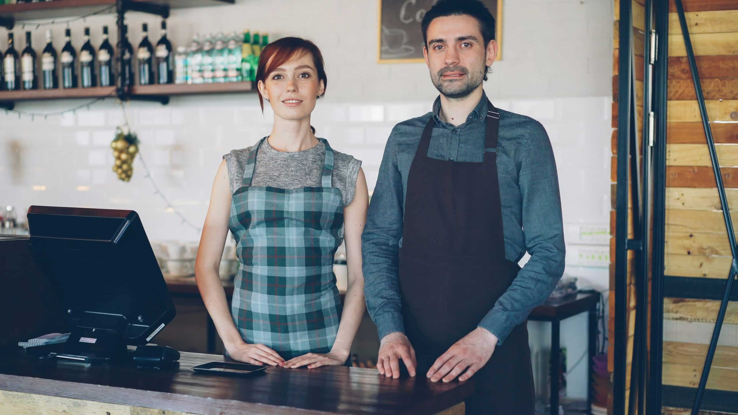 what is a merchant account small business owners behind counter