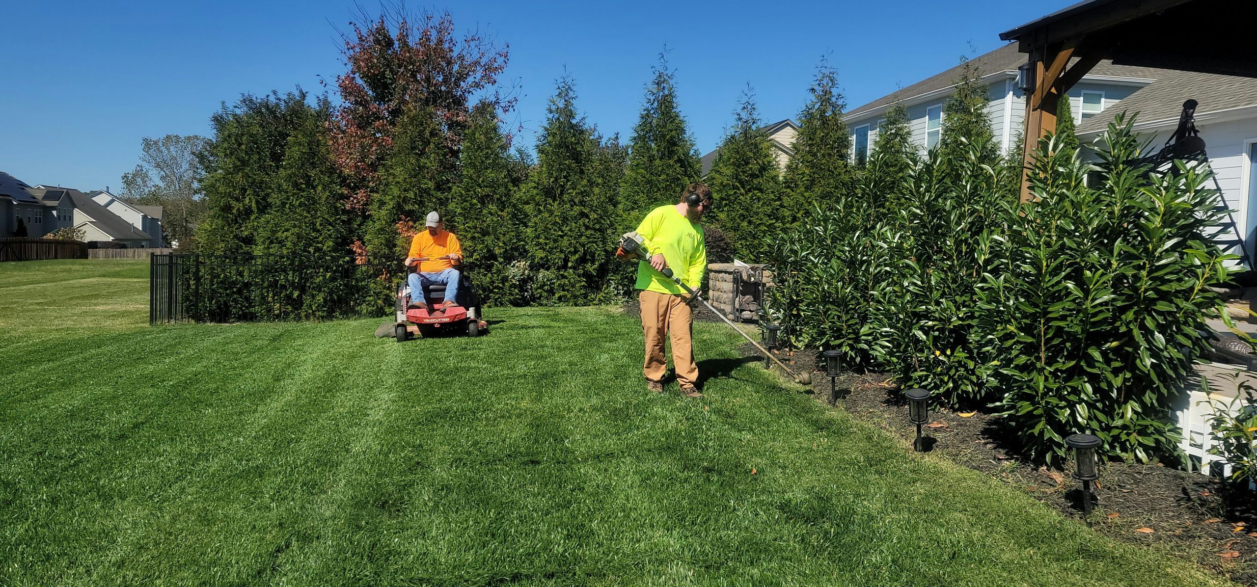 reduce QuickBooks payment processing fees — landscaping business owner reviewing monthly statement
