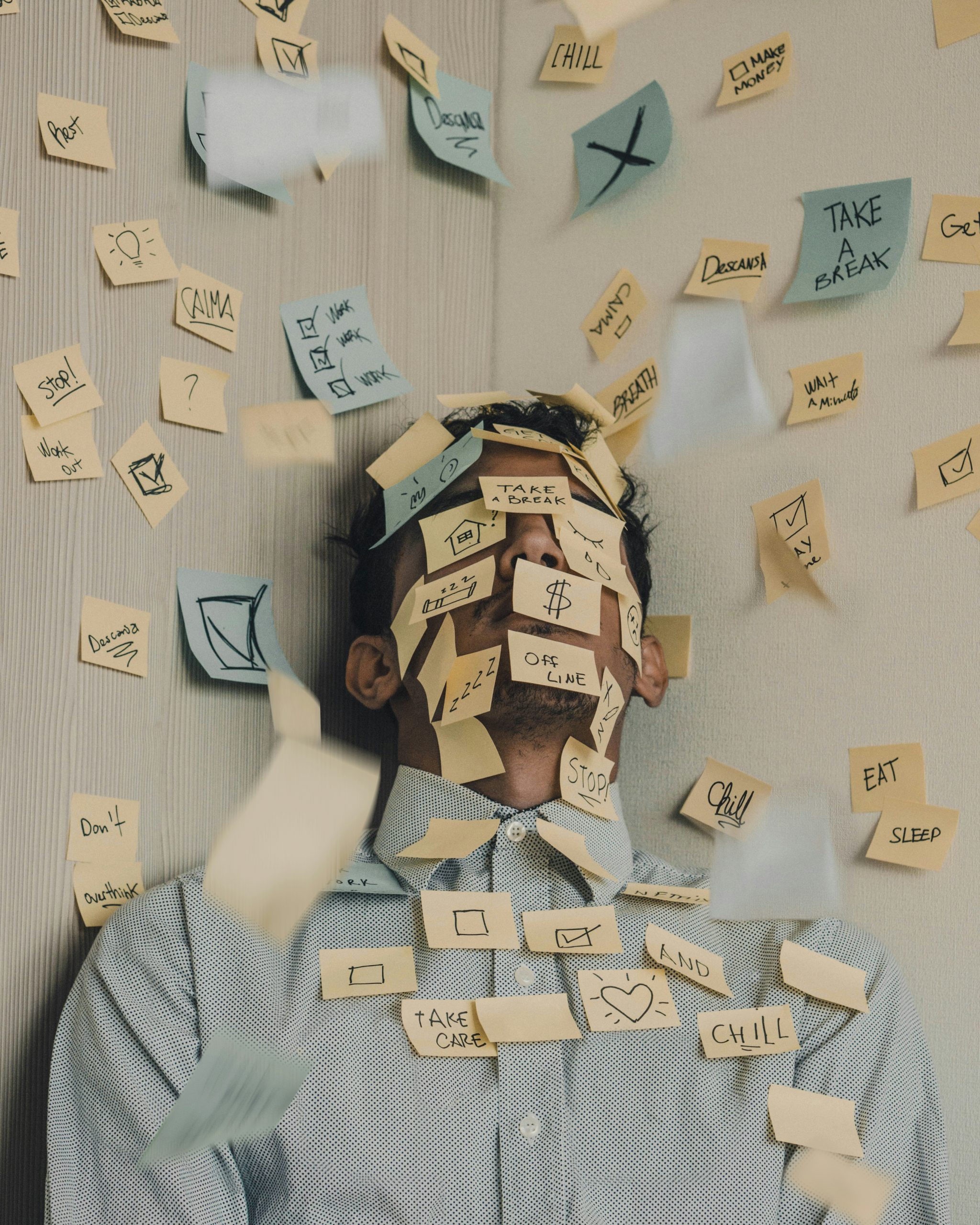 small business accountability — owner overwhelmed with tasks and sticky notes