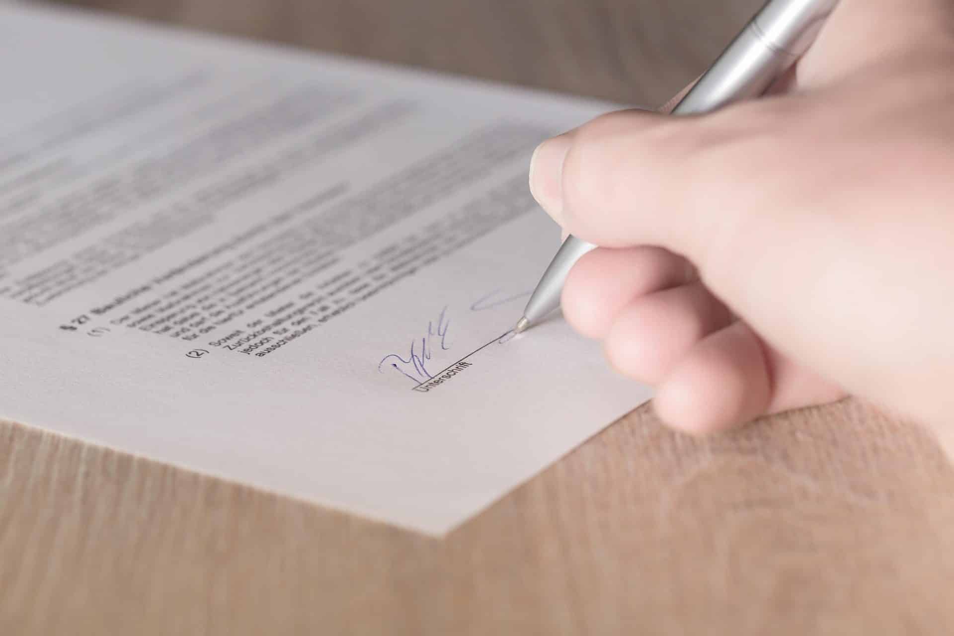 How to get out of a POS lease — the hand signing the commercial contract that gets locked in for 36 months