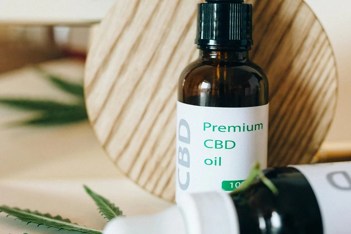 CBD payment processing at a hemp retail counter with a card terminal