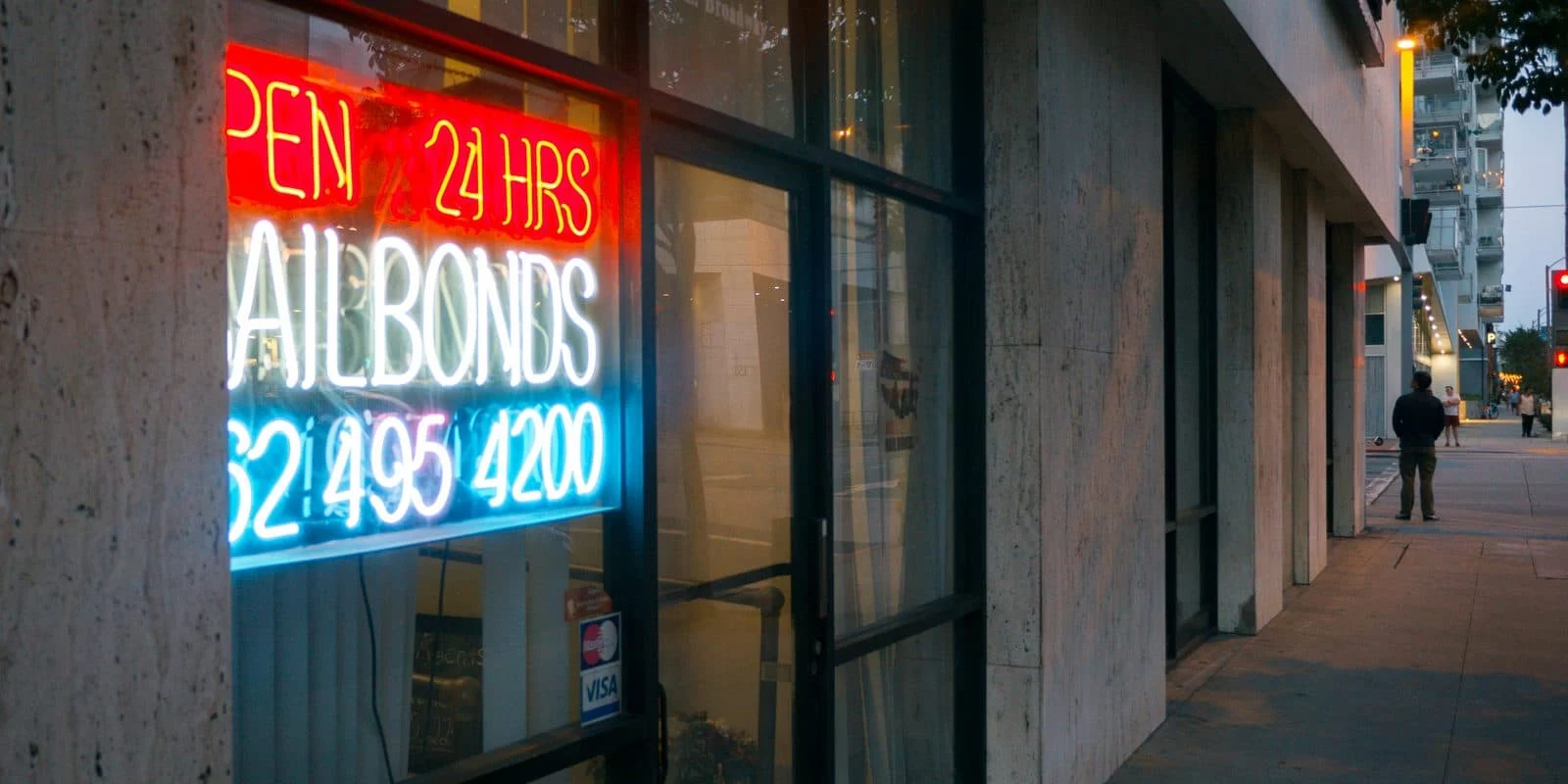 A 24-hour bail bonds storefront accepting Visa and Mastercard — the bail bonds merchant account problem